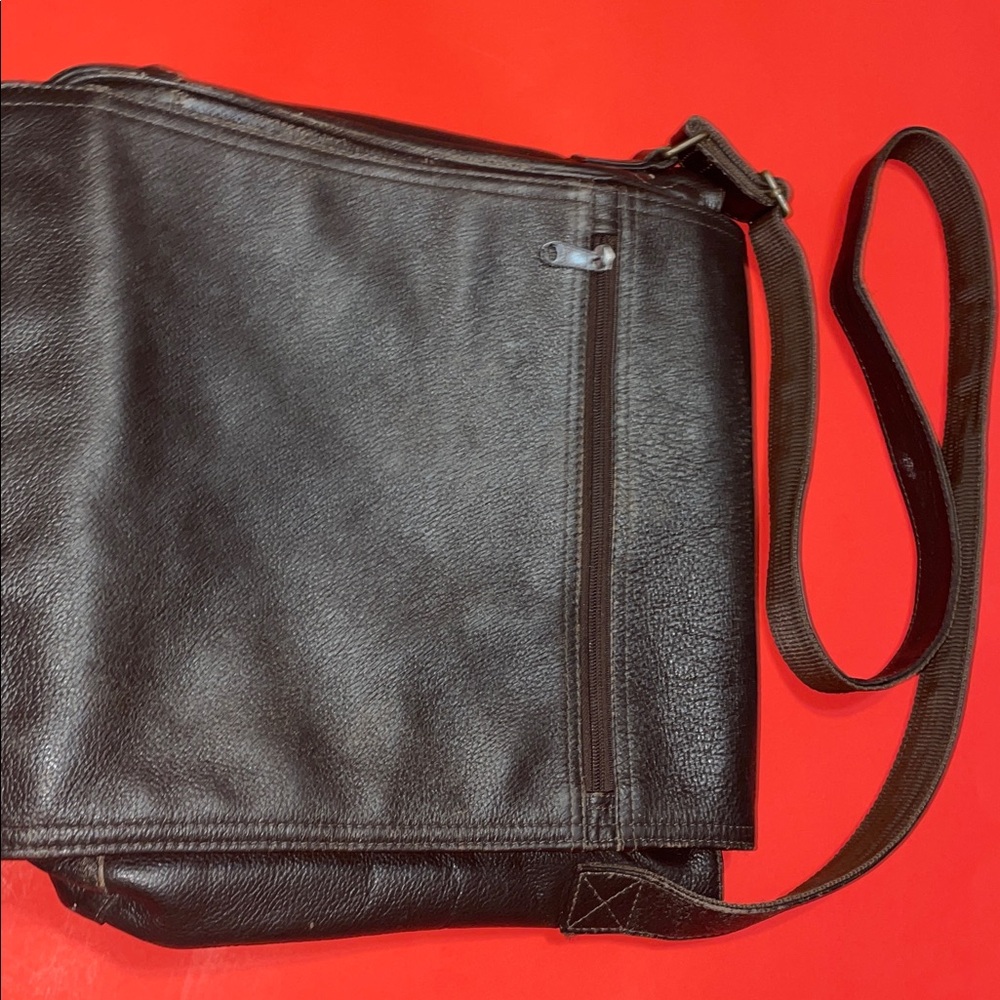 Wilson’s leather messenger bag with cross body strap